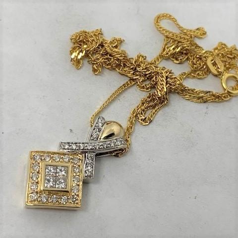 14KT YELLOW GOLD .95CTS DIAMOND PENDANT WITH CHAIN