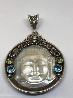 MOTHER OF PEARL CARVED PENDANT W/ AMETHYST, PERIDOT & TOPAZ
