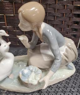 8" TALL LADRO WITH DUCKS PORCELAIN FIGURINE