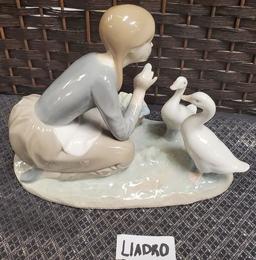 8" TALL LADRO WITH DUCKS PORCELAIN FIGURINE
