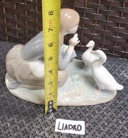 8" TALL LADRO WITH DUCKS PORCELAIN FIGURINE