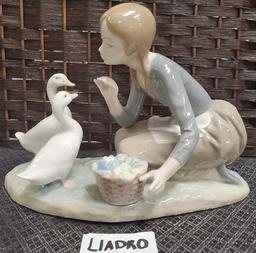 8" TALL LADRO WITH DUCKS PORCELAIN FIGURINE