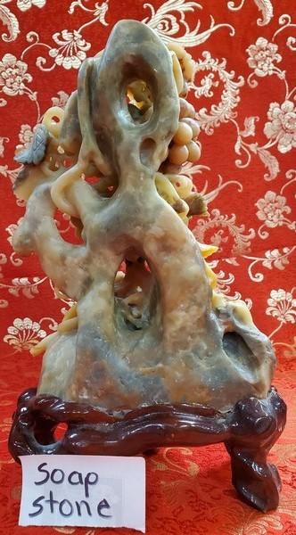 10" TALL SOAP STONE CARVING ON WOOD STAND
