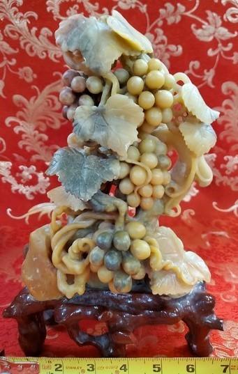 10" TALL SOAP STONE CARVING ON WOOD STAND