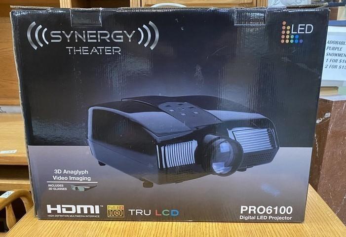 NEW IN BOX PROJECTOR BY SYNERGY.