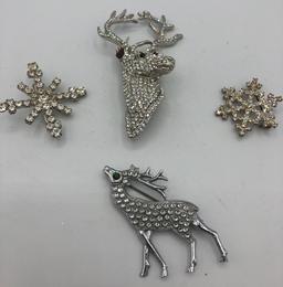 2 Rhinestone Stag Brooches; 2 Snowflake Brooches