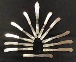 11 Sterling Banded Mother Of Pearl Knives;     1 Serving Knife
