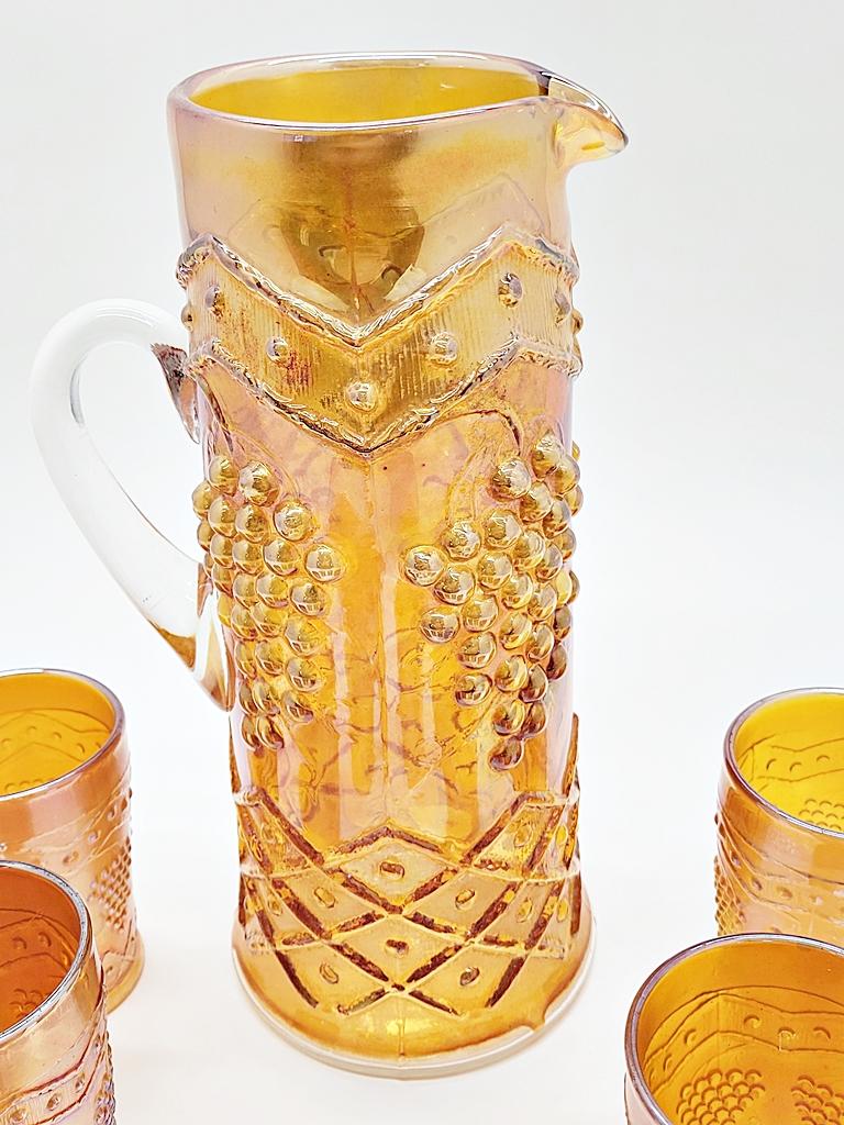 Marigold Fenton Carnival Glass 12" Tankard & 6 Tumblers - Lattice & Grape, 1 Cup Has Chips On Rim