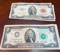 Currency: 1953 A Red Seal (2), 1976 (21) Two Dollar Bills