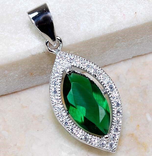1 CT EMERALD & WHITE TOPAZ STERLING PENDENT