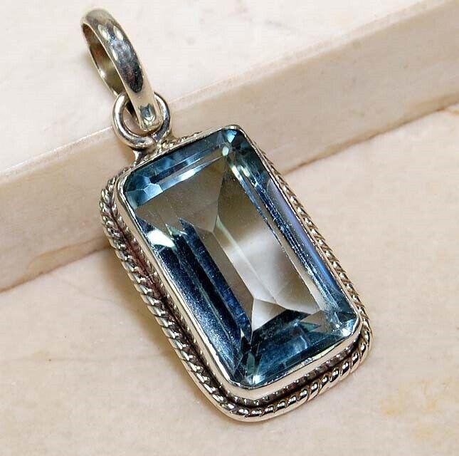 12 CT NATURAL BLUE TOPAZ STERLING SILVER PENDANT