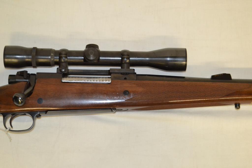 Gun. Winchester Model 70 7mm mag cal Rifle