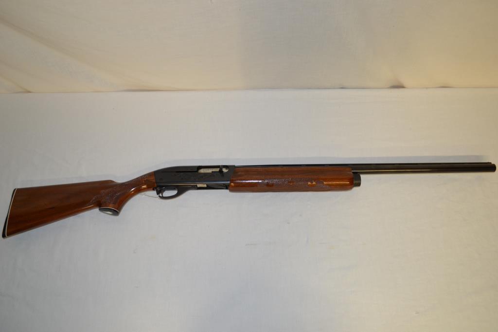 Gun. Remington Model 1100 12 ga Shotgun