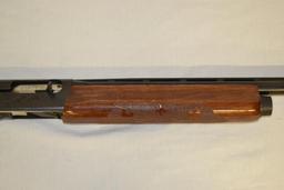 Gun. Remington Model 1100 12 ga Shotgun