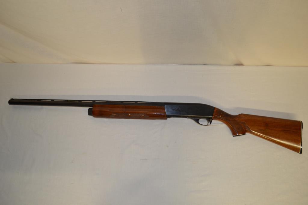 Gun. Remington Model 1100 12 ga Shotgun