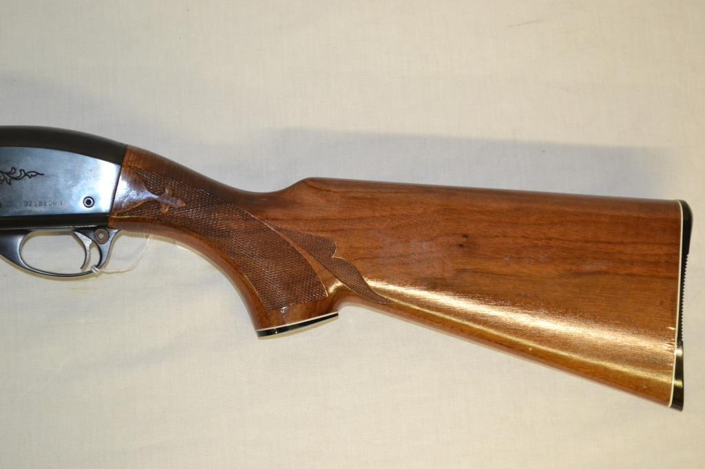 Gun. Remington Model 1100 12 ga Shotgun