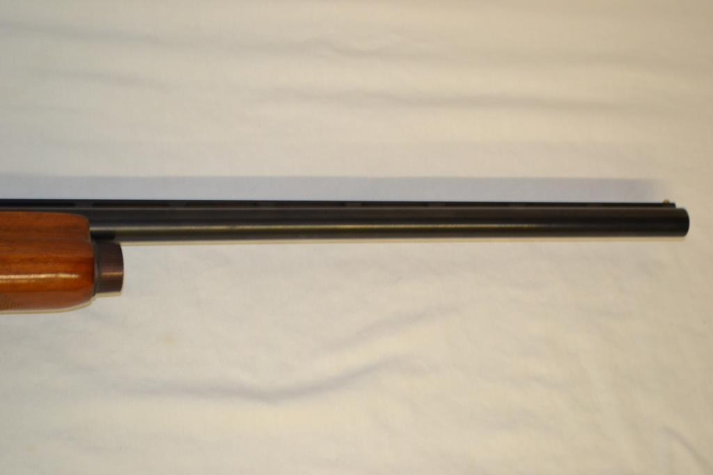 Gun. Remington Model 1100 12ga Shotgun