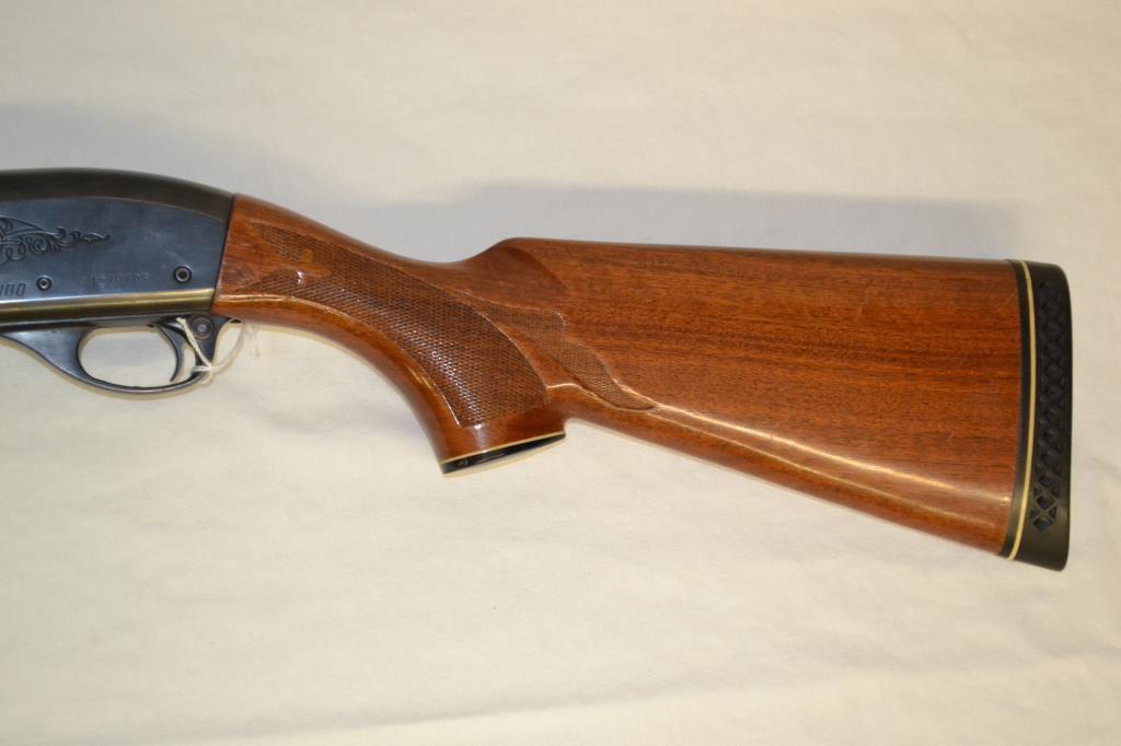 Gun. Remington Model 1100 12ga Shotgun