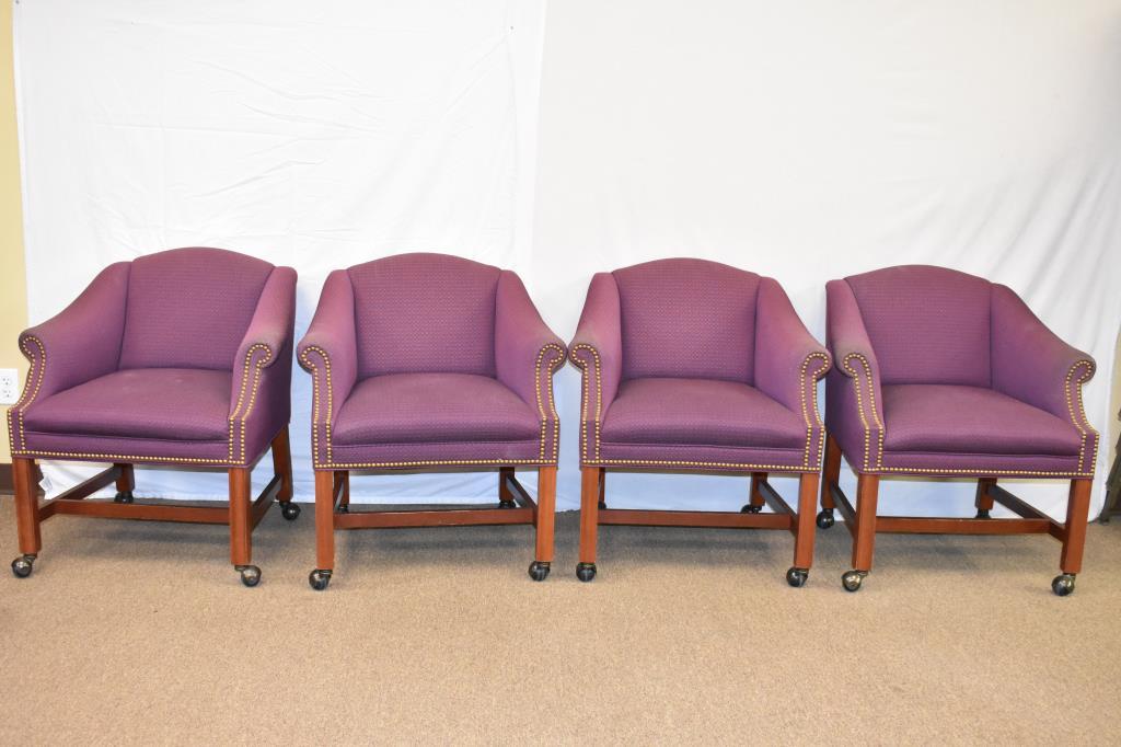 Four Upholstered Chairs on Casters
