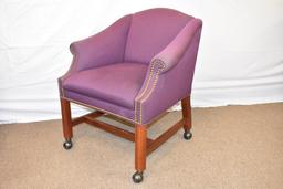 Four Upholstered Chairs on Casters