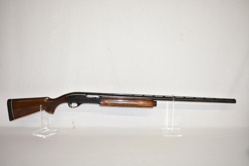 Gun. Remington Model 1100 Mag 12ga Shotgun