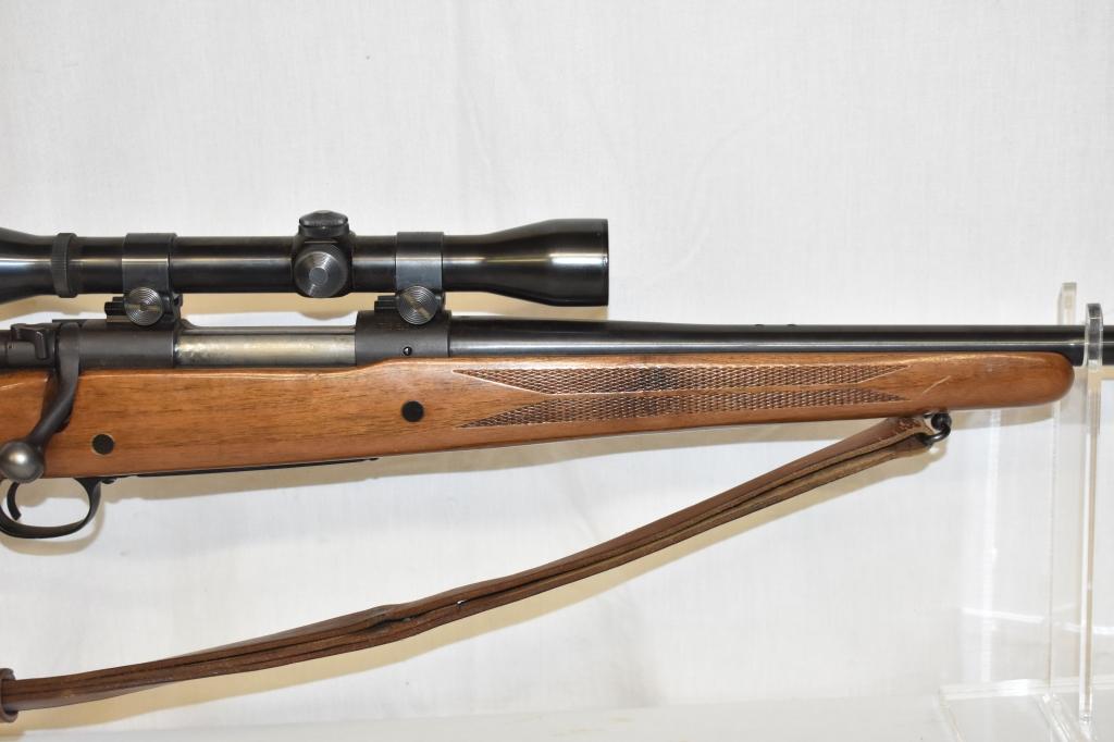 Gun. Winchester Model 70 7mm mag cal Rifle