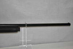 Gun. Remington Model 1100 12ga Shotgun