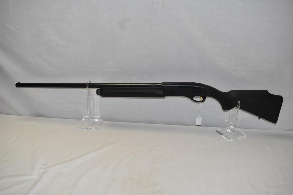 Gun. Remington Model 1100 12ga Shotgun