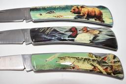 Three Folding Hunting Scene Knives with Display