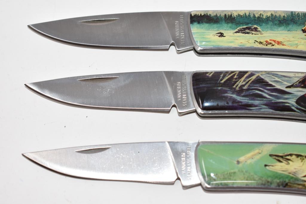 Three Folding Hunting Scene Knives with Display