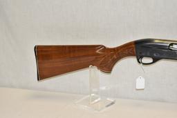 Gun. Remington Model 1100 12ga Shotgun