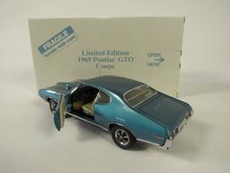 Sharp 1969 Pontiac GTO Coupe Limited Edition Danbury Mint 1:24 scale die-cast model car.