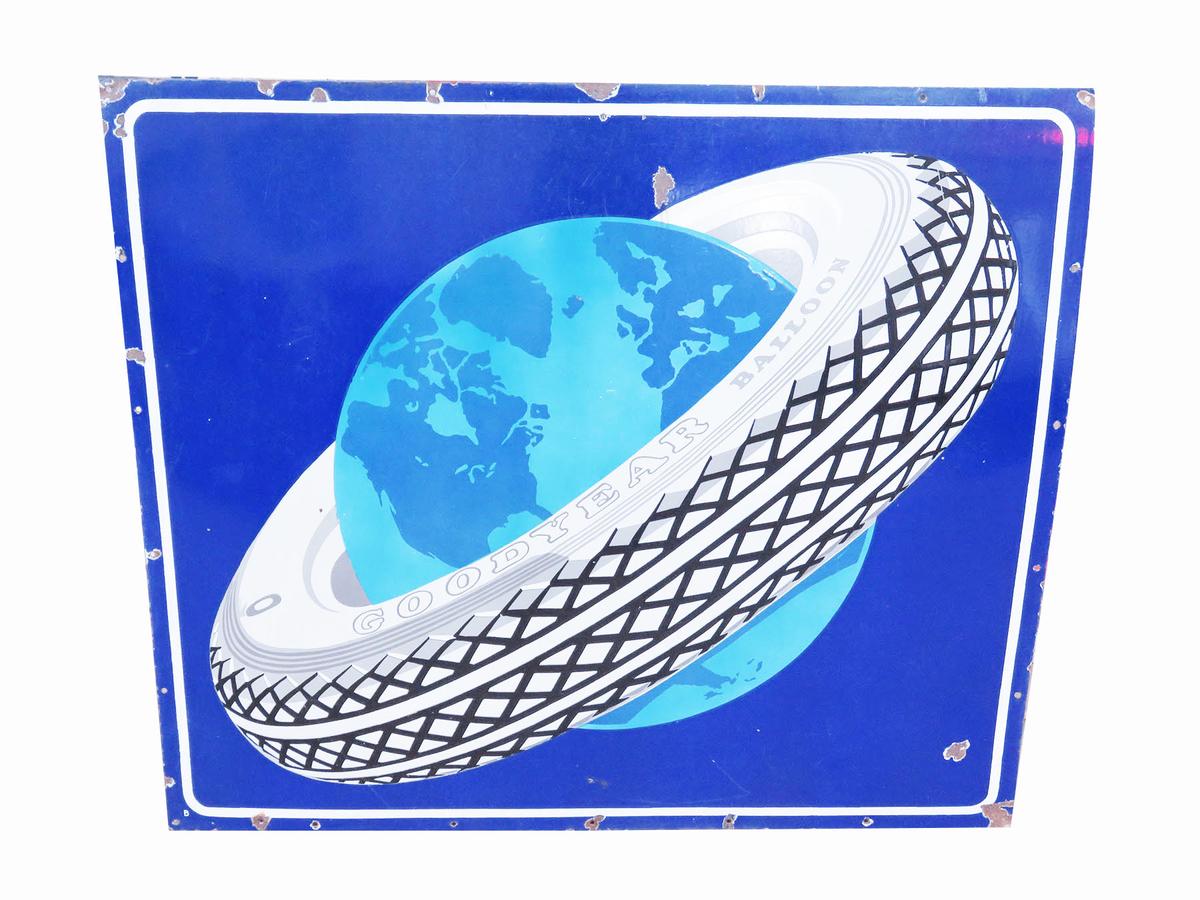 Fabulous 1930s Goodyear Balloon Tires single-sided porcelain garage sign with tire/globe logo.