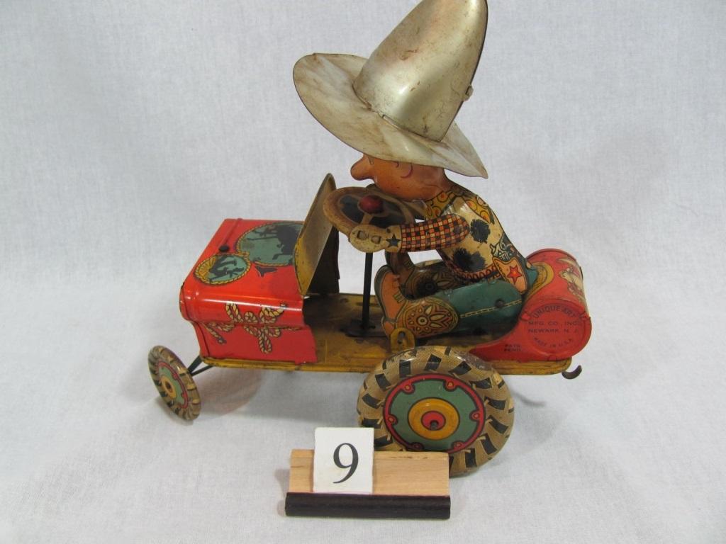 "1 in lot, Unique Art  Git Along Lil' Doggie Wind up, works well, cowboy bu