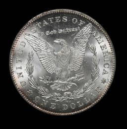 ***Auction Highlight*** 1878-cc Morgan $1 Beautiful rim toning Graded ms65 By ICG Ultra clean (fc)