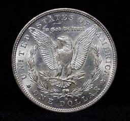 ***Auction Highlight*** 1879-o Morgan Dollar $1 Graded GEM Unc by USCG (fc)