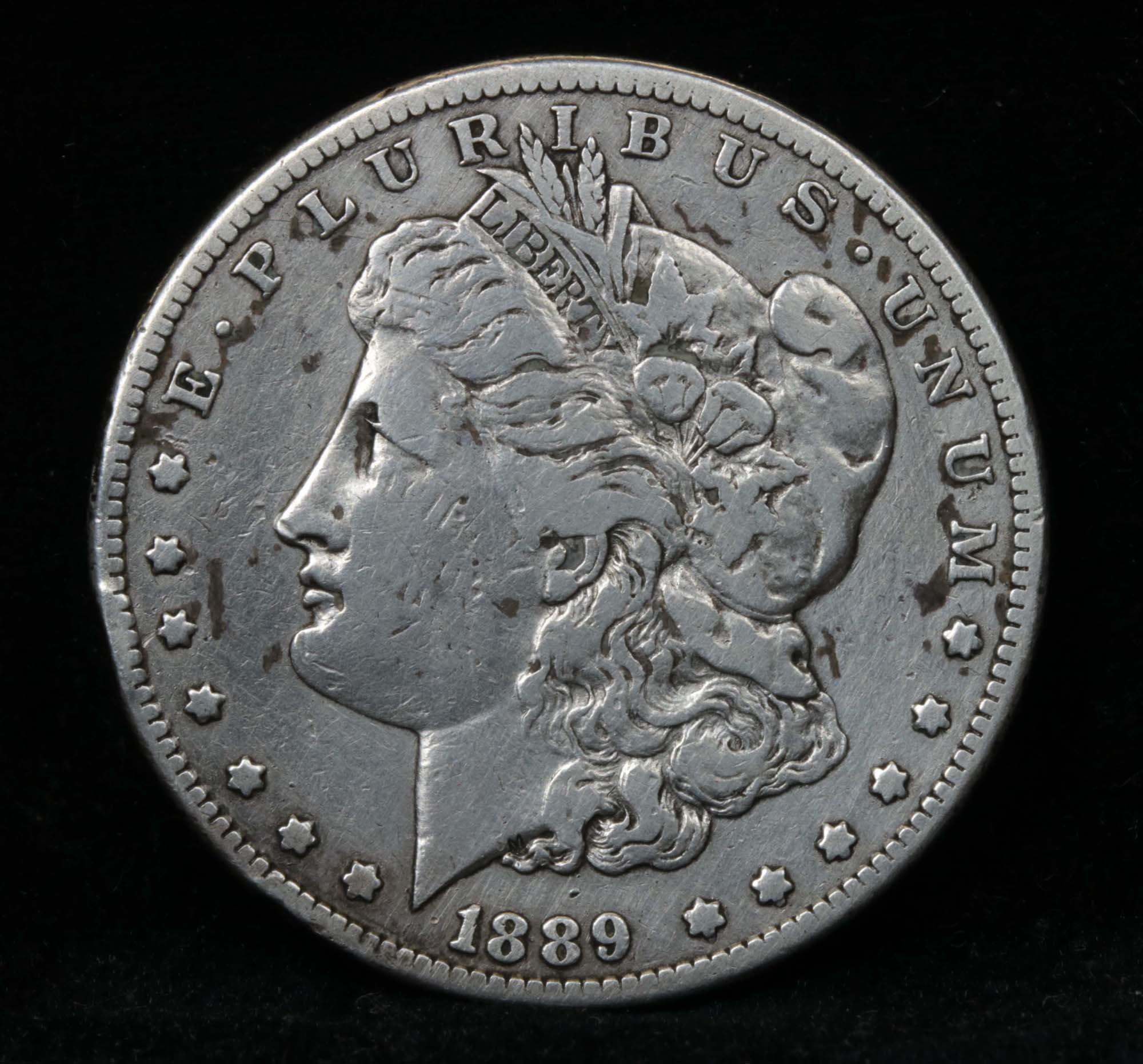 ***Auction Highlight*** 1889-cc Morgan Dollar $1 Graded vf++ by USCG. King
