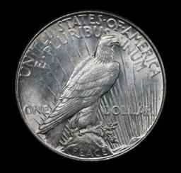 ***Auction Highlight*** 1935-p Peace Dollar $1 Graded GEM+ Unc by USCG (fc)