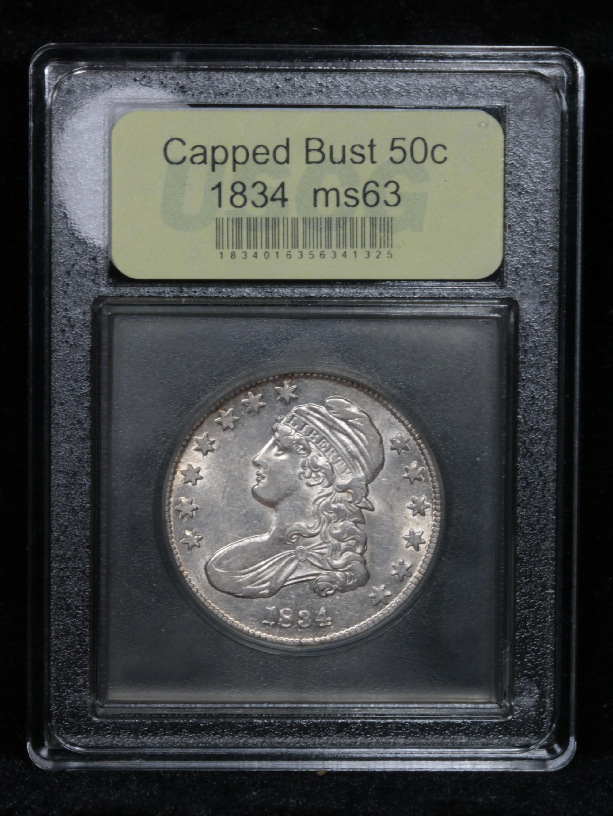 ***Auction Highlight*** 1834 Capped Bust Half Dollar 50c Graded Select Unc by USCG (fc)