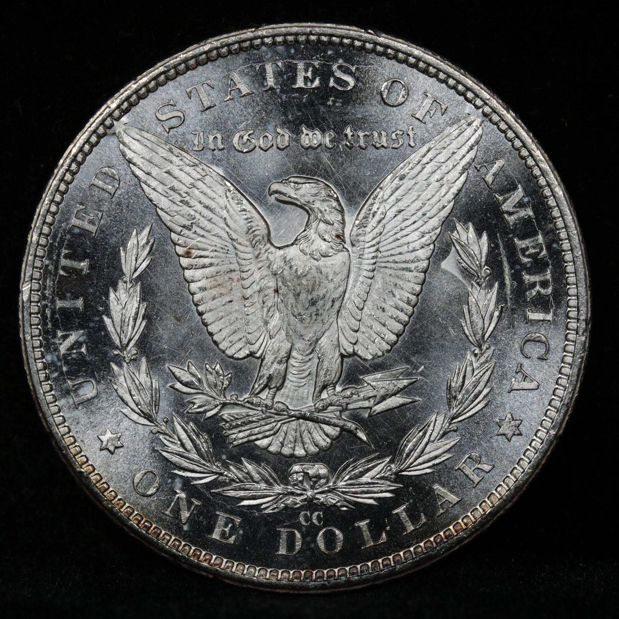 ***Auction Highlight*** 1883-cc Morgan Dollar $1 Graded GEM Unc DMPL By USCG (fc)