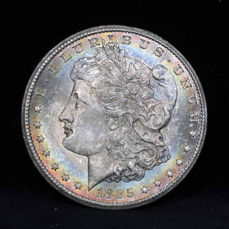 ***Auction Highlight*** 1885-cc Rainbow Toned Morgan Dollar $1 Graded Choice+ Unc by USCG (fc)