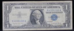 1957A $1 Blue Seal Silver Certificate . . Grades vf+