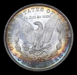 ***Auction Highlight*** 1879-p Rainbow Toned Morgan Dollar $1 Graded GEM+ Unc By USCG (fc)