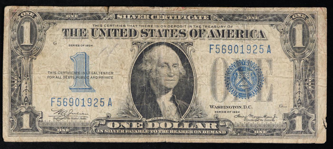 1934 $1 Blue Seal Silver Certificate "Funnyback" Grades f details