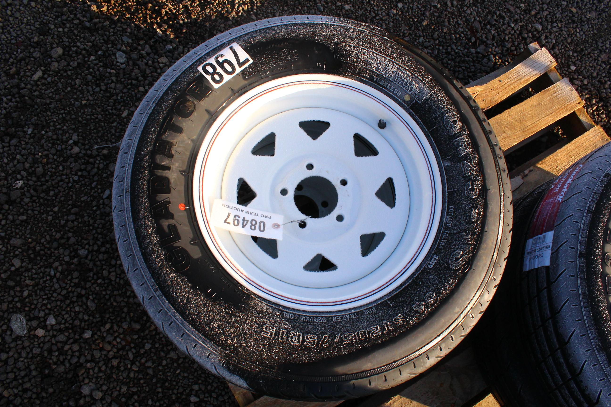 QTY 2) TRAILER TIRES ON 5 LUG WHEELS ST205 / 75-15, TAG #8497