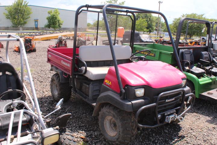 KAWASAKI 3010 MULE 4X4, DUMP BED, SHOWING 1953 HRS, S/N# KAF62OE, TAG# 9394