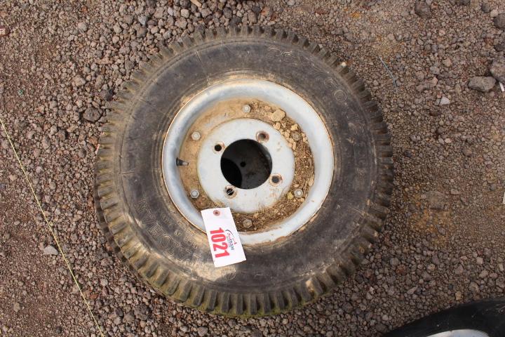 QTY 2) 4 LUG 12" TRACTOR TIRE & RIMS