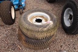 QTY 2) 4 LUG 12" TRACTOR TIRE & RIMS