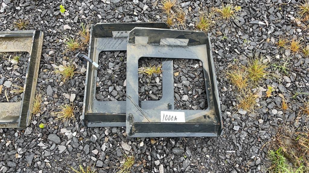 UNUSED SKID STEER ATTACHMENT PLATES