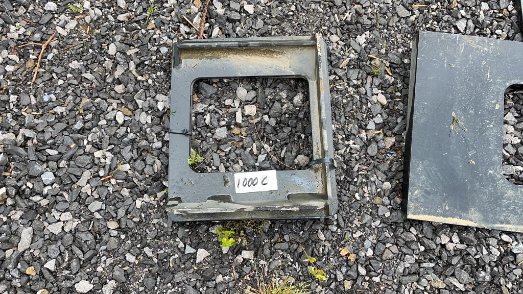 UNUSED SKID STEER ATTACHMENT PLATES